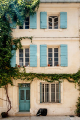 windows in an old facade typical of the French provence