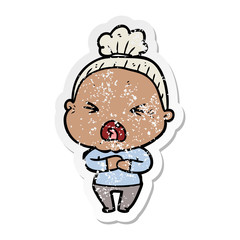 distressed sticker of a cartoon angry old woman