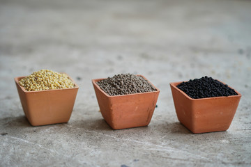 Three color of  Diammonium phosphate (DAP) in clay pots