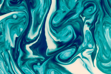Cyan liquid ink swirl abstract background