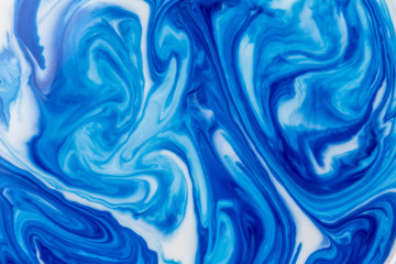 Blue liquid ink swirl abstract background