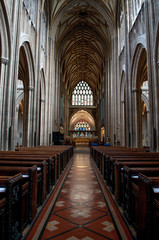 Fototapeta na wymiar Central nave leading to the chancel and altar, St Mary Redcliffe Church, Bristol, UK