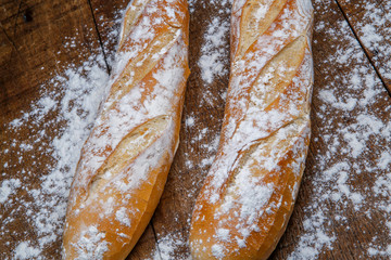 Fresh bread or french baguett and flour