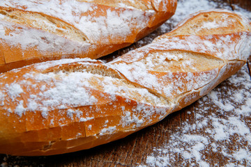 Fresh bread or french baguett and flour