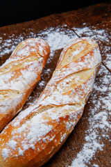 Fresh bread or french baguett and flour