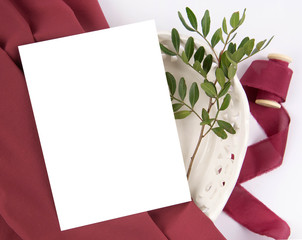 Burgundy wedding invitation mockup with silk ribbon