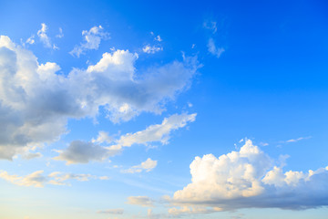 Blue sky background and white clouds in sunny day before sunset with skyspace