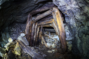 Сollapse of wooden supports in an abandoned underground mine