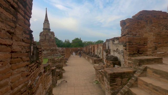 Walking through the ancient ruins of the Wat Mahathat temple.