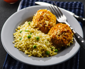 Carrot balls with bulgur and barley porridge. Vegetarian dish. Healthy food