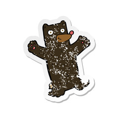 retro distressed sticker of a cartoon black bear