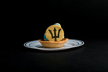 Pastry on Black background with Barbadian Trident