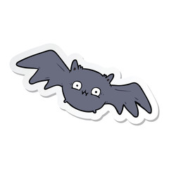 sticker of a cartoon halloween bat