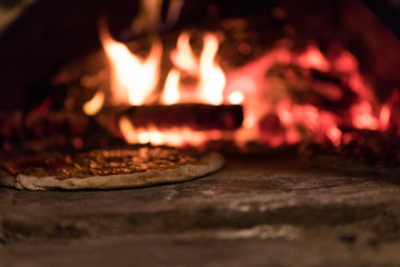 Pizza in firebrick oven