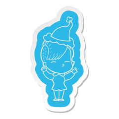 cartoon  sticker of a squinting girl wearing santa hat