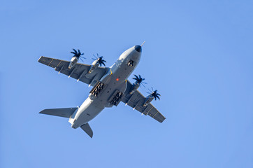 Military aircraft landing at the airport Berlin-Tegel over the residential area