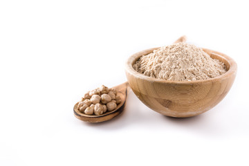 chickpea flour in wooden bowl isolated on white background. Copyspace
