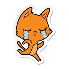 sticker of a crying cartoon cat