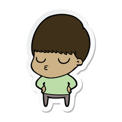sticker of a cartoon calm boy