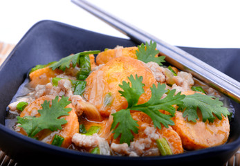Stir Fried Tofu in a bowl with sesame and greens. Homemade healthy vegan asian meal - fried tofu