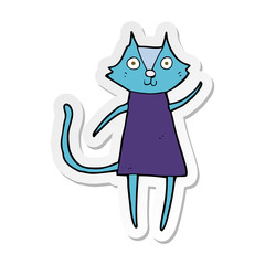 sticker of a cute cartoon black cat waving