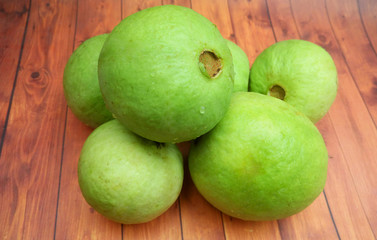  guava - fresh guava fruit with a wooden background