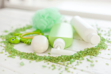 Bathing stuff. Shampoo, tonic, mask, liquid soap, balm bottles top view. Toiletries flatlay.