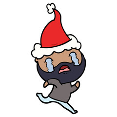 line drawing of a bearded man crying wearing santa hat