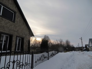 Winter sunset on a village street