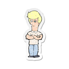 retro distressed sticker of a cartoon man with folded arms