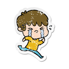 distressed sticker of a cartoon boy crying