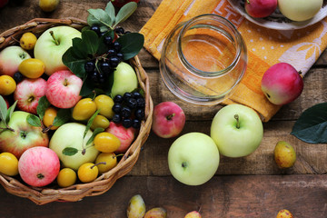 Village garden berries and fruits: apples, plums, Rowan, top view.