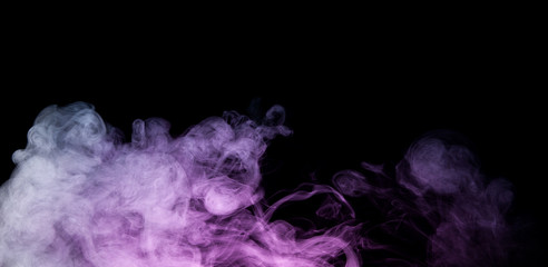 Colorful smoke on black background