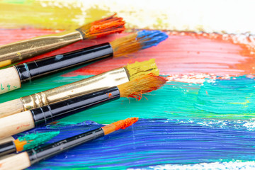 Obraz premium Paint brushes and paints for drawing.