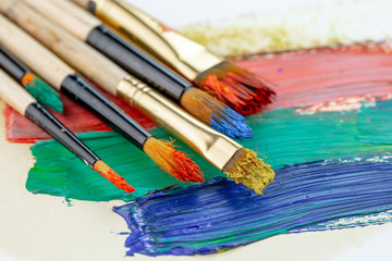 Obraz premium Paint brushes and paints for drawing.