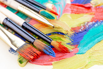 Obraz premium Paint brushes and paints for drawing.