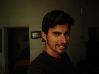 young man of arab descent wearing black shirt