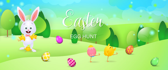 Easter Egg Hunt bright banner design. Cartoon bunny hugging little chicks, eggs on grass. Illustration can be used for posters, flyers, leaflets