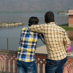 Tourists looking at lake, Jal Mahal Grand Palace, Man Sagar Lake, Jaipur, Rajasthan, India