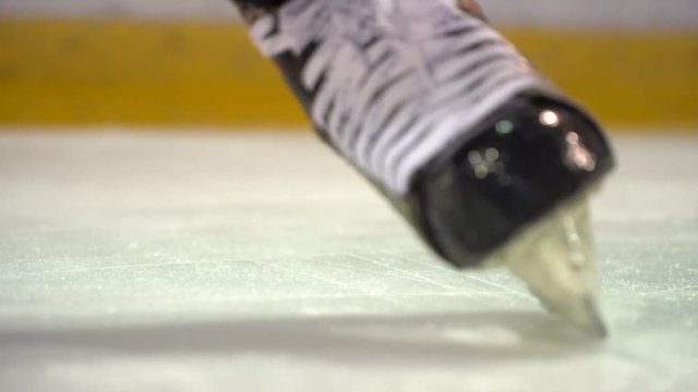 stick hitting hit hockey puck in slow motion