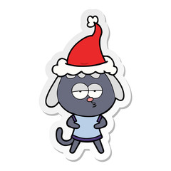 sticker cartoon of a bored dog wearing santa hat