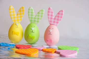 Three easter hares in hearts