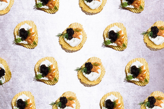 Caviar on Potato Chips with Cr&egrave;me Fra&icirc;che