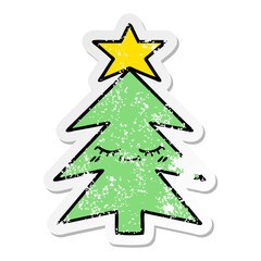 Fototapeta premium distressed sticker of a cute cartoon christmas tree