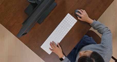 Woman work on computer at home