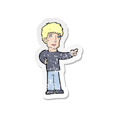retro distressed sticker of a cartoon pointing man