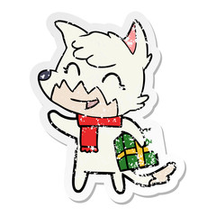 distressed sticker of a happy cartoon fox