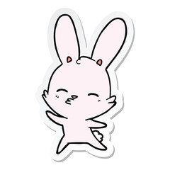 sticker of a curious waving bunny cartoon