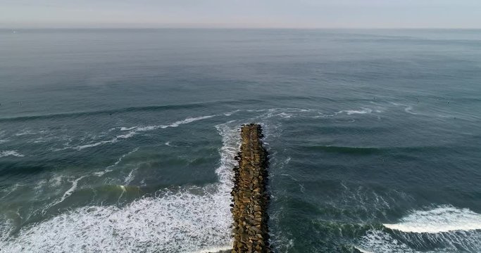 Rock jetty in the ocean.