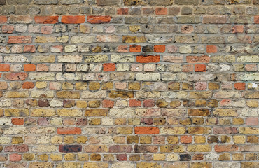 yellow red brick wall texture